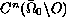 $C^n(\bar{\Omega}_{0}\backslash O)$