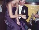groom and bridesmaid