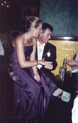 groom and bridesmaid